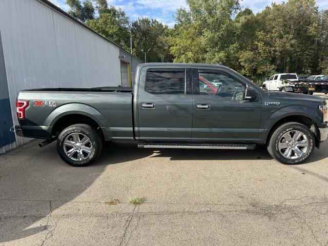 used 2018 Ford F-150 car, priced at $23,565