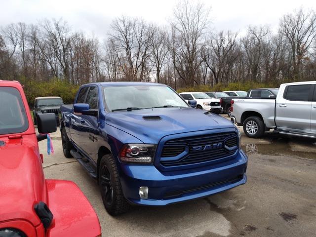 used 2018 Ram 1500 car, priced at $27,028