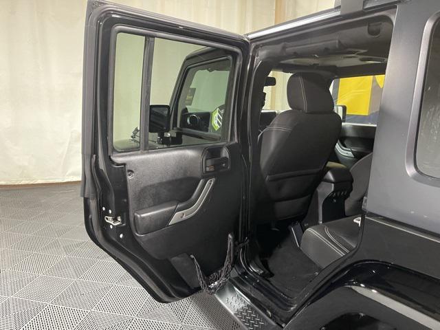 used 2014 Jeep Wrangler Unlimited car, priced at $16,429