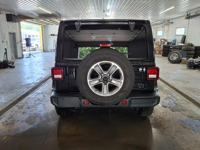 used 2021 Jeep Wrangler Unlimited car, priced at $28,342