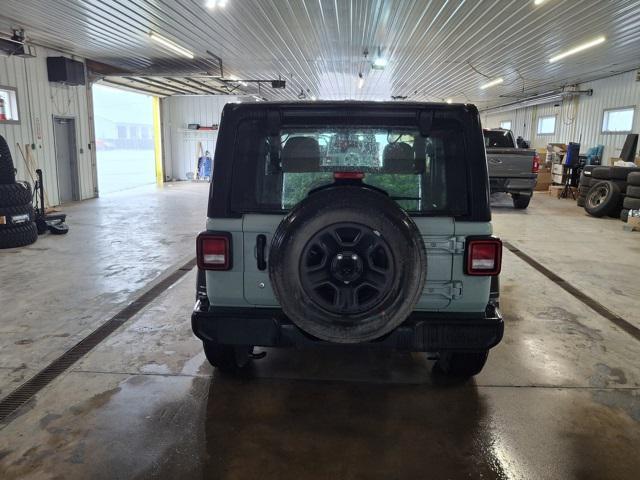 used 2023 Jeep Wrangler car, priced at $27,900