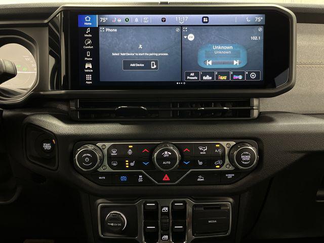 used 2024 Jeep Wrangler 4xe car, priced at $33,000