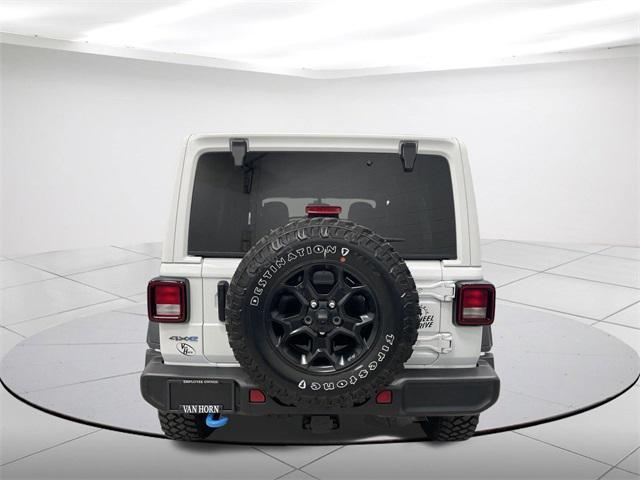 used 2023 Jeep Wrangler 4xe car, priced at $34,224