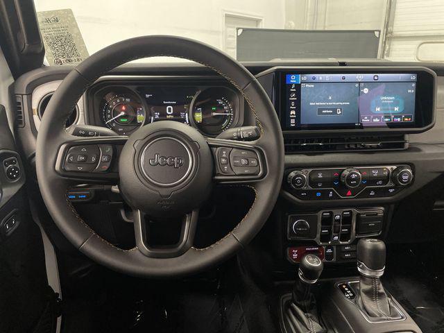 used 2024 Jeep Wrangler 4xe car, priced at $35,994