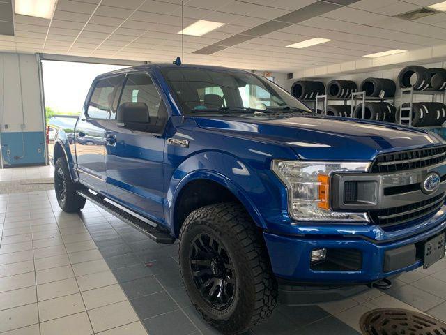 used 2018 Ford F-150 car, priced at $27,228