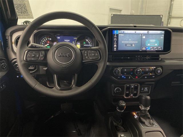 used 2024 Jeep Wrangler 4xe car, priced at $36,998