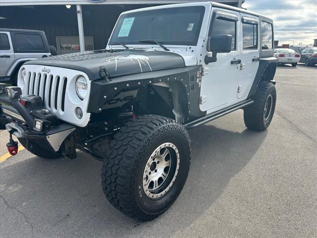 used 2015 Jeep Wrangler Unlimited car, priced at $23,363