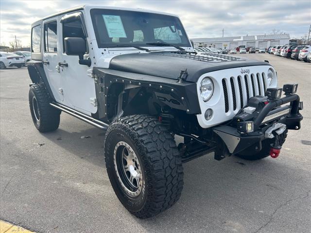 used 2015 Jeep Wrangler Unlimited car, priced at $23,363