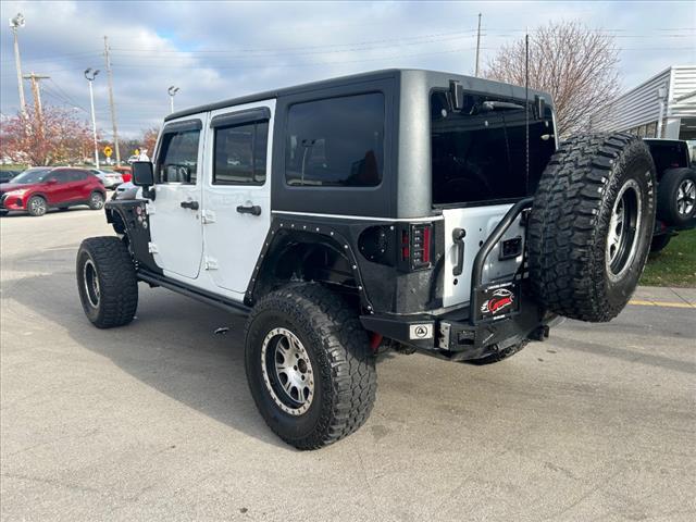 used 2015 Jeep Wrangler Unlimited car, priced at $23,363