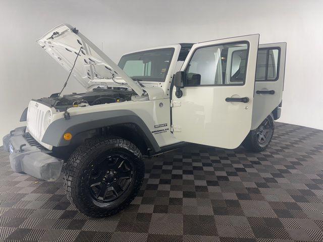 used 2014 Jeep Wrangler Unlimited car, priced at $18,000