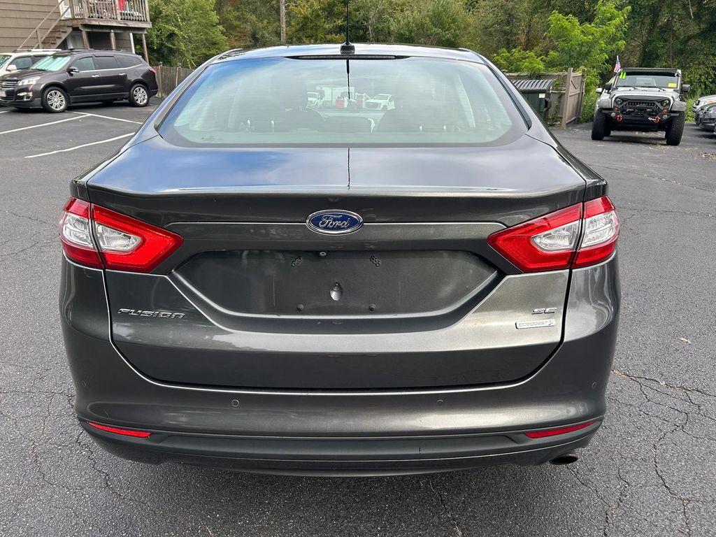 used 2015 Ford Fusion car, priced at $6,795