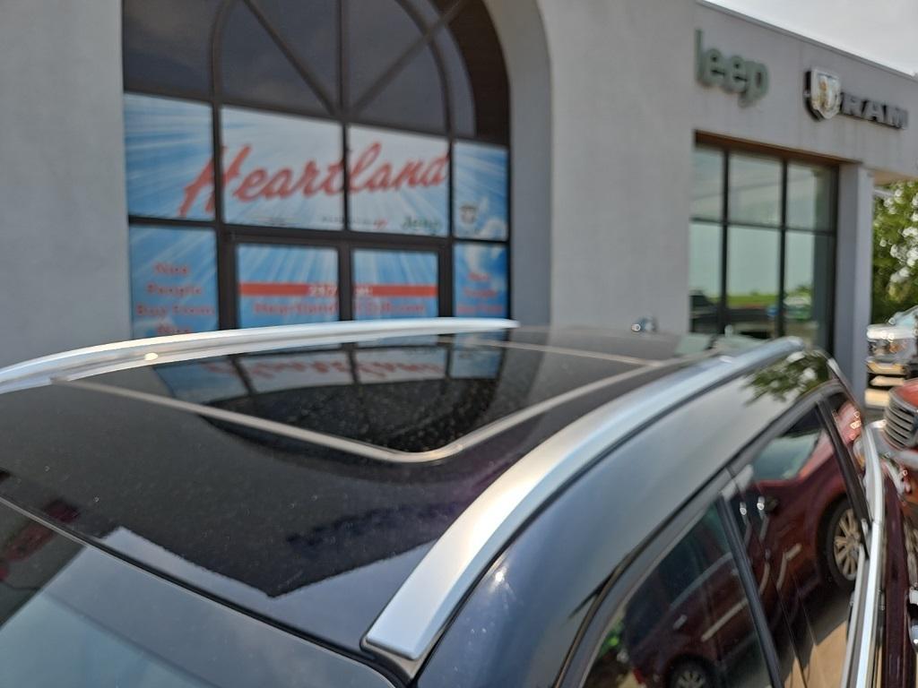used 2024 Toyota Highlander Hybrid car, priced at $49,995