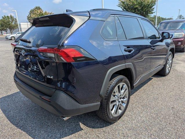 used 2022 Toyota RAV4 car, priced at $28,000