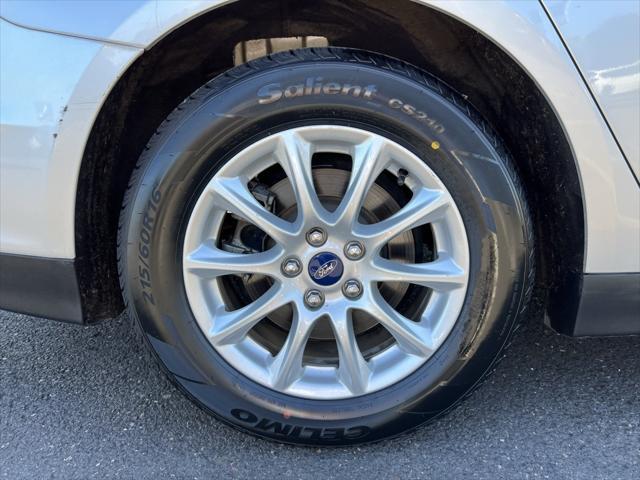 used 2016 Ford Fusion car, priced at $10,000