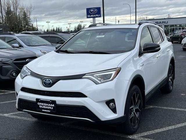 used 2018 Toyota RAV4 Hybrid car, priced at $28,000