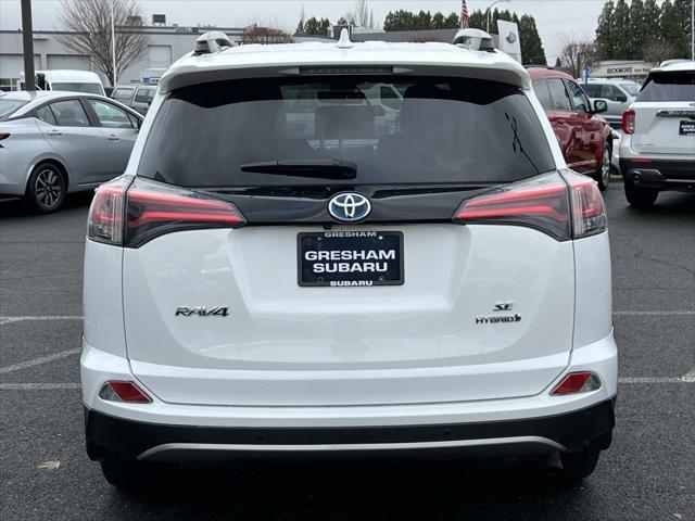 used 2018 Toyota RAV4 Hybrid car, priced at $28,000