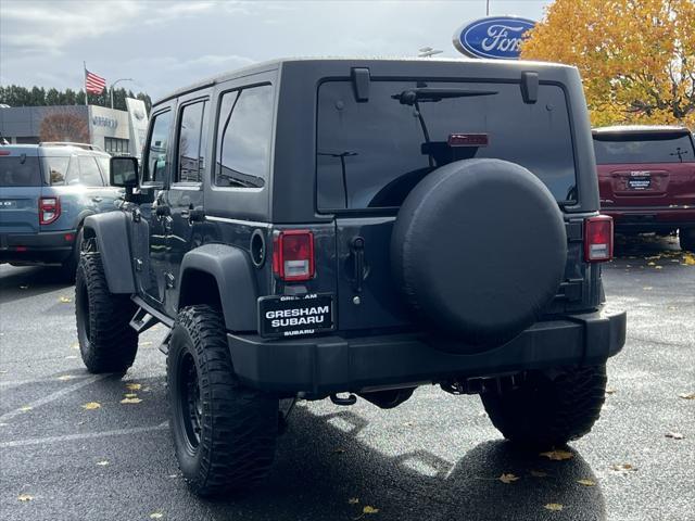 used 2016 Jeep Wrangler Unlimited car, priced at $27,100