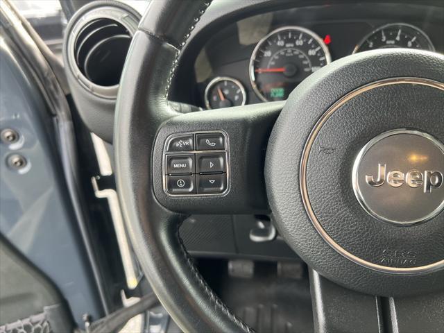 used 2016 Jeep Wrangler Unlimited car, priced at $27,100