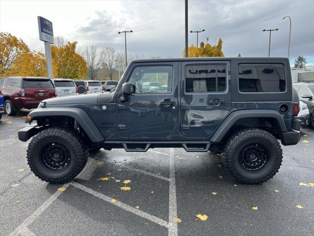 used 2016 Jeep Wrangler Unlimited car, priced at $27,100