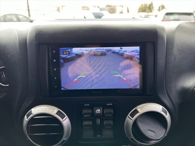 used 2017 Jeep Wrangler Unlimited car, priced at $26,546