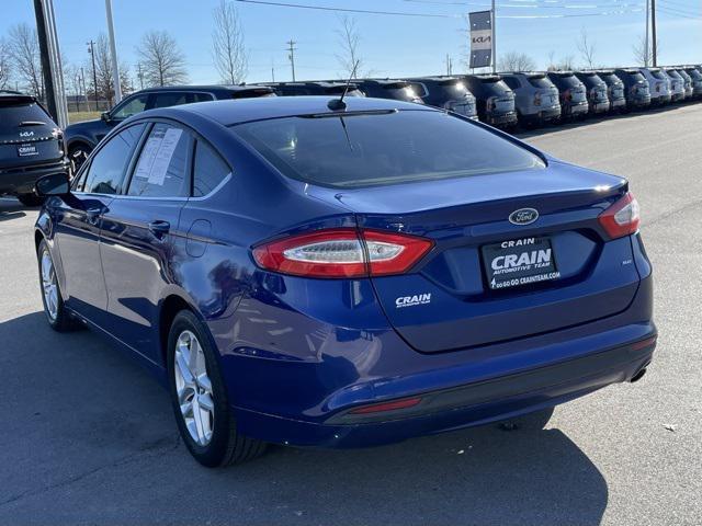 used 2014 Ford Fusion car, priced at $11,681