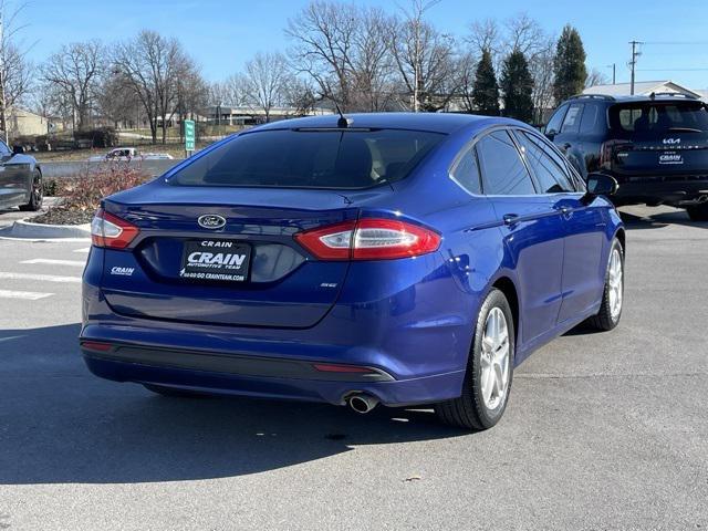 used 2014 Ford Fusion car, priced at $11,681