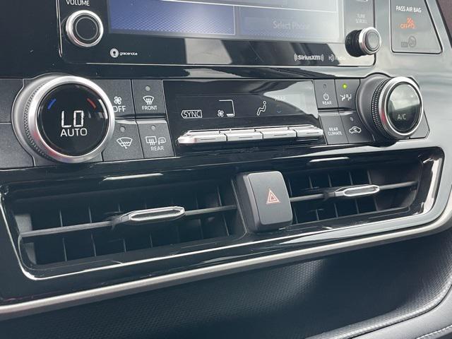 used 2022 Toyota Highlander Hybrid car, priced at $31,590