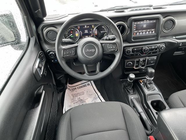 used 2023 Jeep Wrangler 4xe car, priced at $29,255