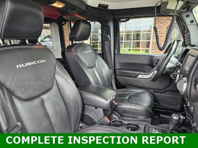 used 2015 Jeep Wrangler Unlimited car, priced at $27,371