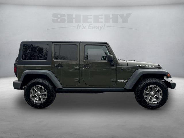 used 2015 Jeep Wrangler Unlimited car, priced at $16,695