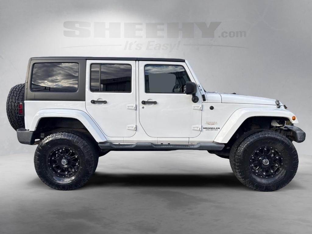 used 2014 Jeep Wrangler Unlimited car, priced at $14,295