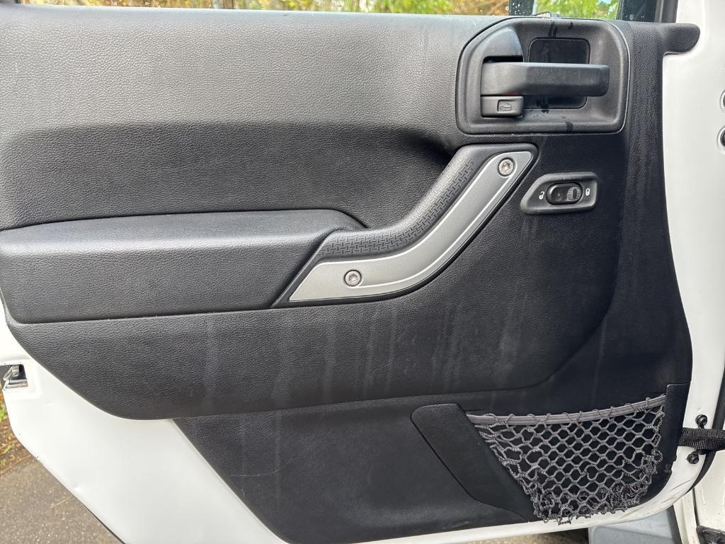 used 2014 Jeep Wrangler Unlimited car, priced at $14,295