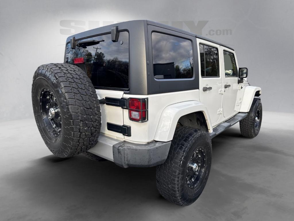 used 2014 Jeep Wrangler Unlimited car, priced at $14,295