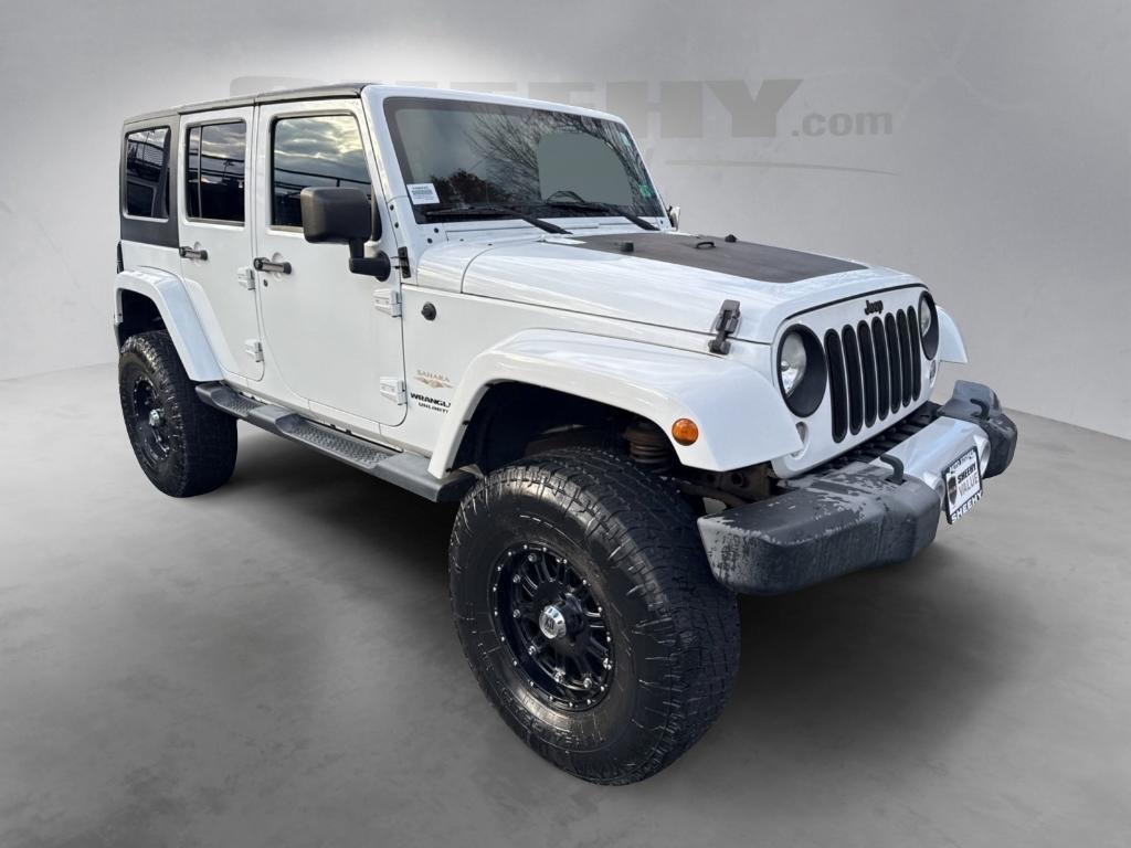 used 2014 Jeep Wrangler Unlimited car, priced at $14,295