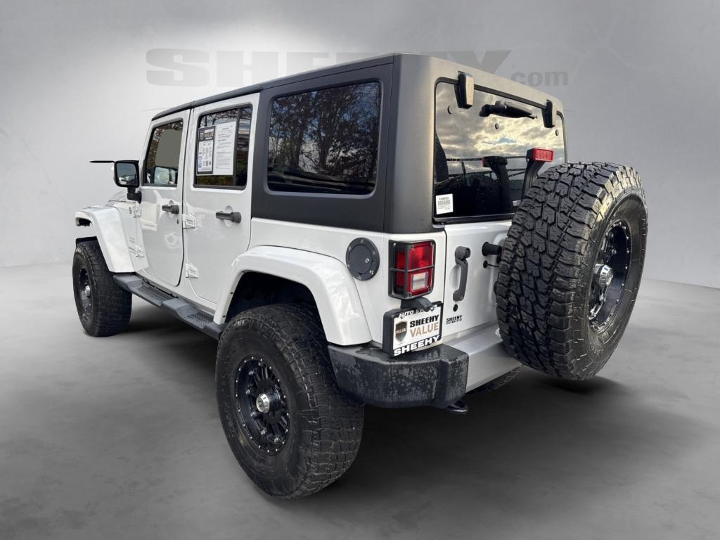used 2014 Jeep Wrangler Unlimited car, priced at $14,295