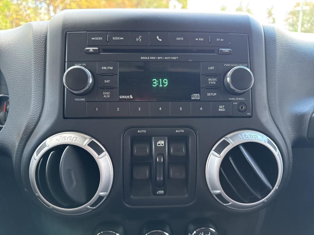 used 2014 Jeep Wrangler Unlimited car, priced at $14,295