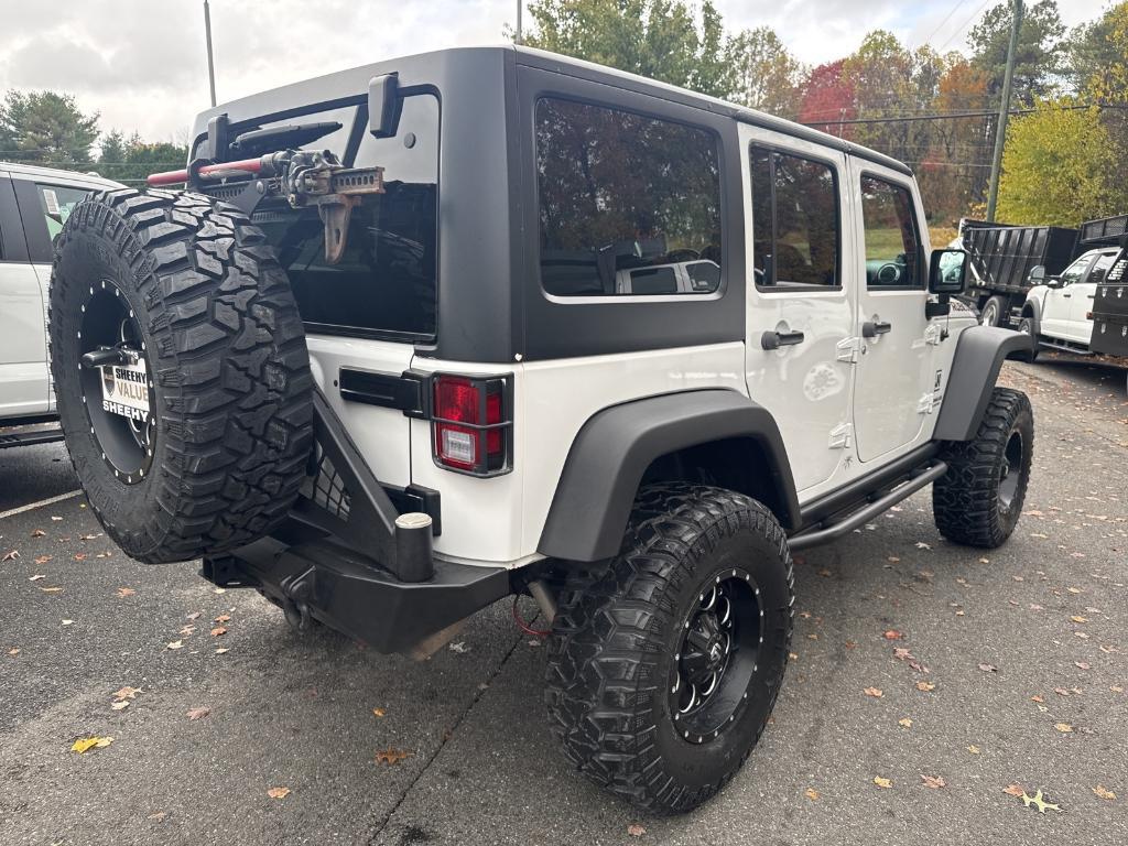 used 2013 Jeep Wrangler Unlimited car, priced at $18,695