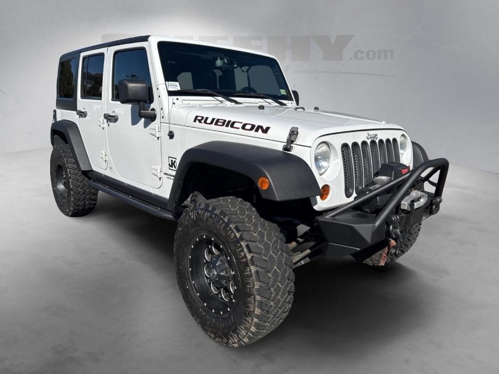 used 2013 Jeep Wrangler Unlimited car, priced at $18,695