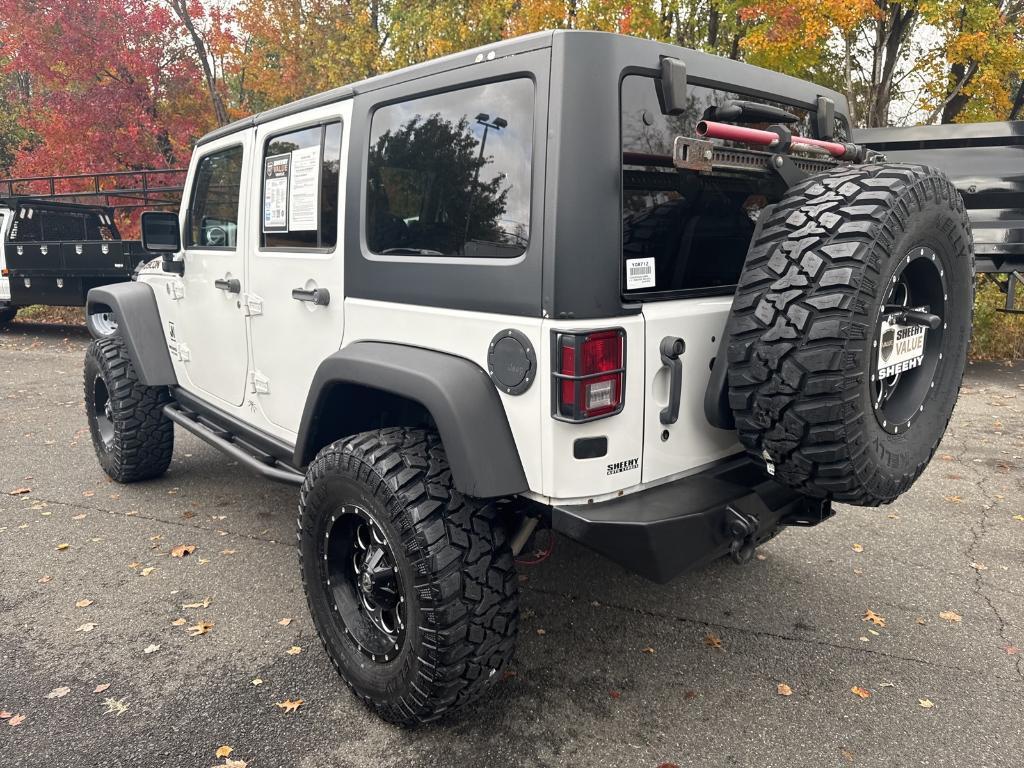 used 2013 Jeep Wrangler Unlimited car, priced at $18,695