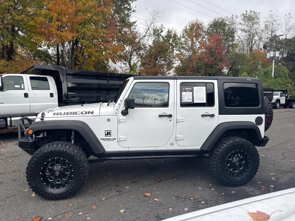 used 2013 Jeep Wrangler Unlimited car, priced at $18,695