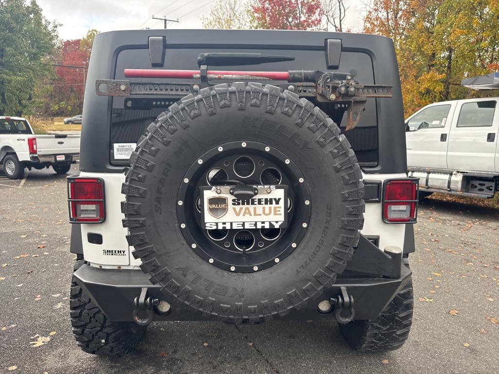 used 2013 Jeep Wrangler Unlimited car, priced at $18,695