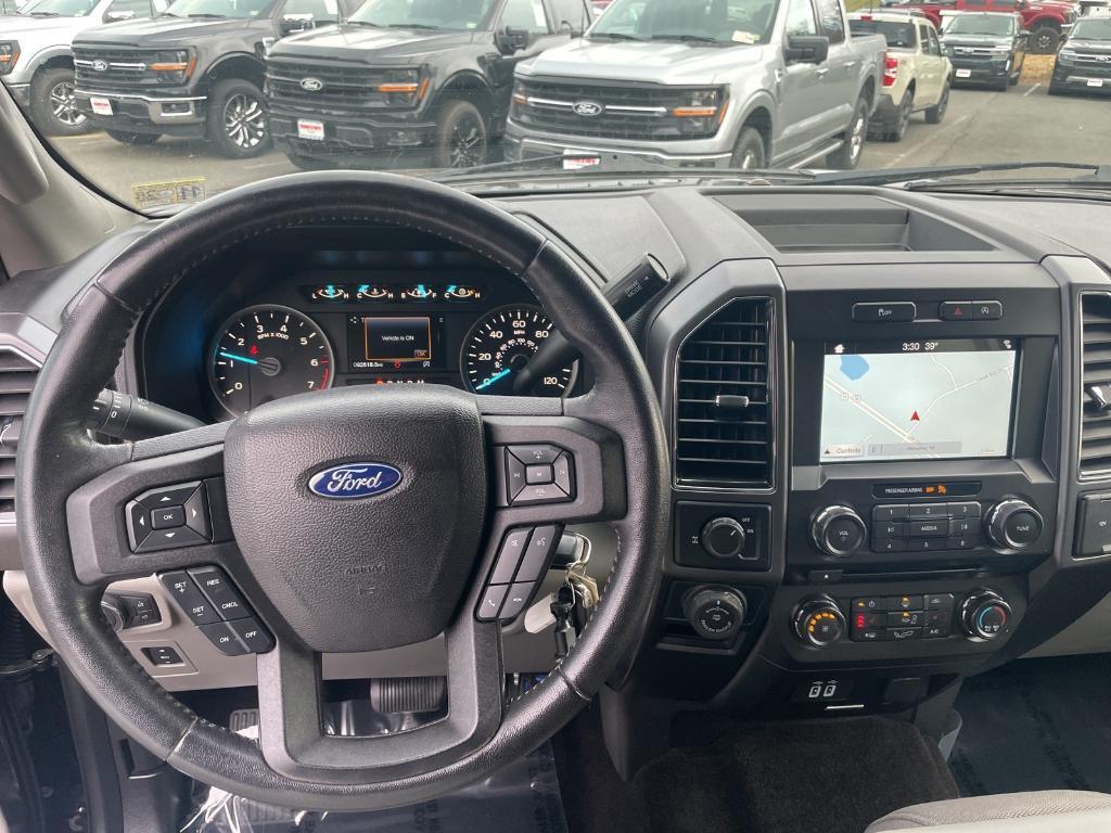 used 2018 Ford F-150 car, priced at $22,595