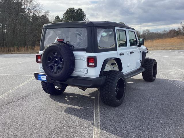 used 2023 Jeep Wrangler car, priced at $33,368