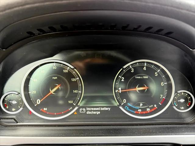 used 2015 BMW 750 car, priced at $13,985