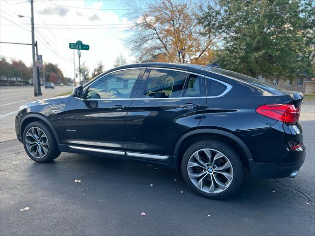 used 2015 BMW X4 car, priced at $13,987