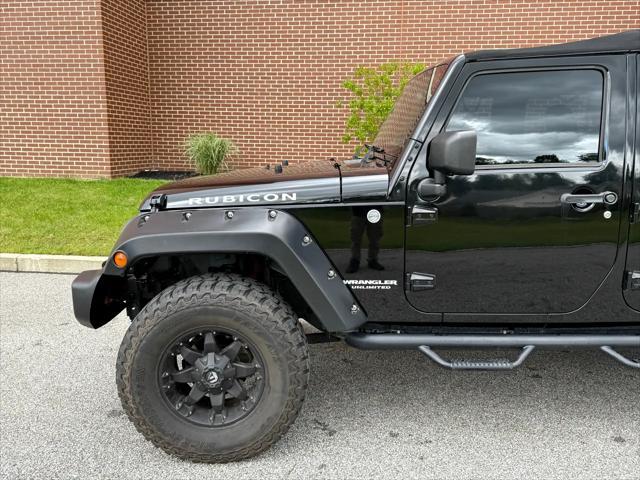 used 2014 Jeep Wrangler Unlimited car, priced at $15,995