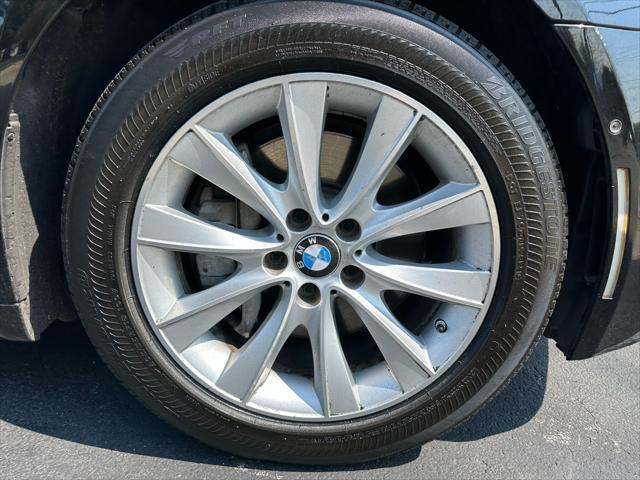 used 2015 BMW 750 car, priced at $9,985