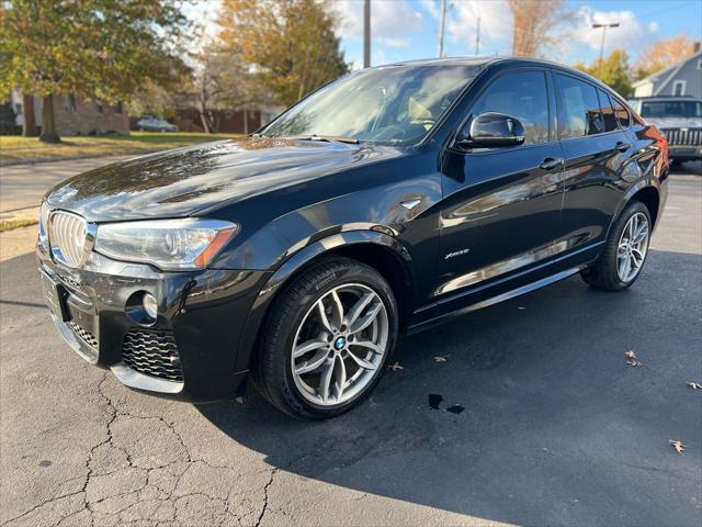 used 2016 BMW X4 car, priced at $15,987