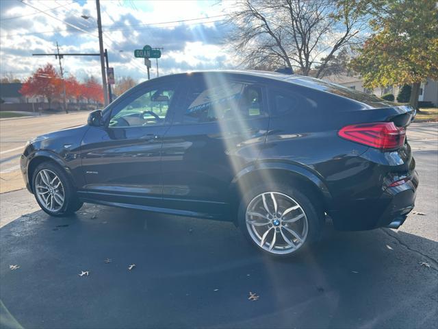 used 2016 BMW X4 car, priced at $15,987