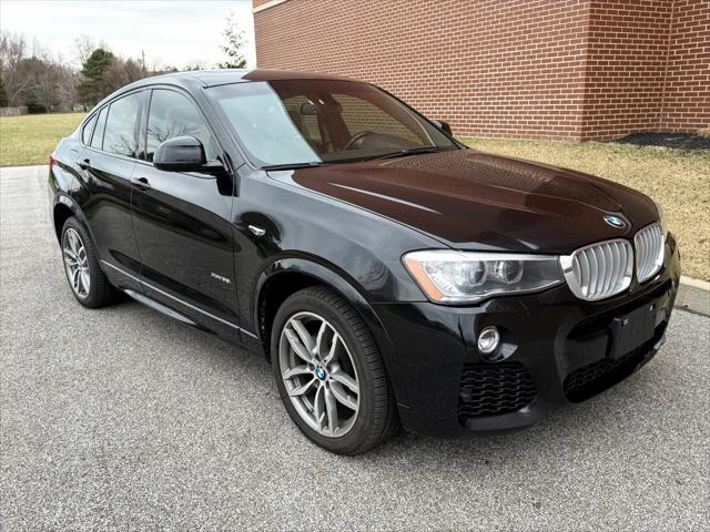 used 2016 BMW X4 car, priced at $12,987
